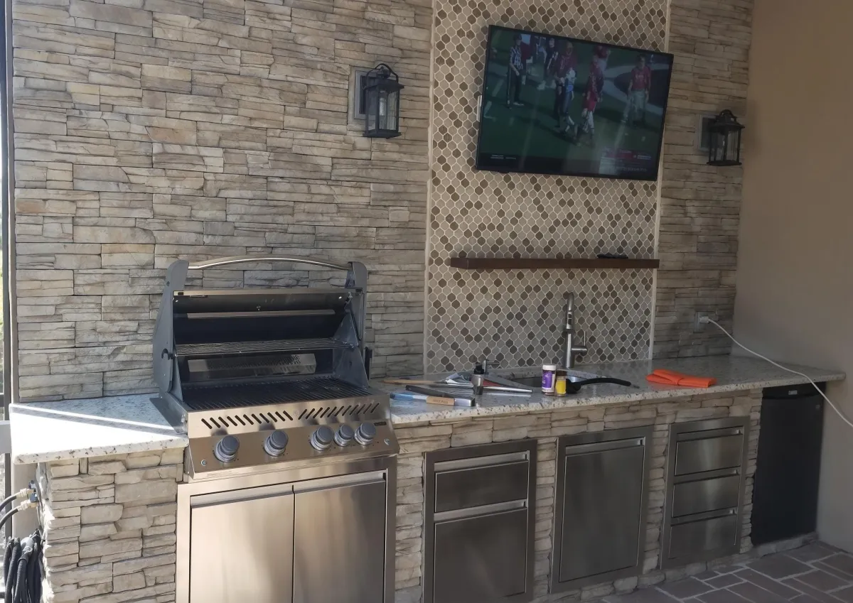 Custom outdoor kitchen stonework and masonry by Tampa Concrete Creations